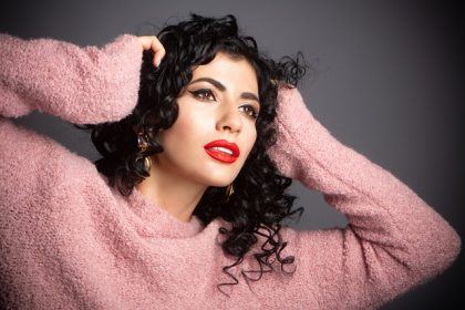 woman in pink winter jumper