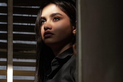 woman - wooden blinds