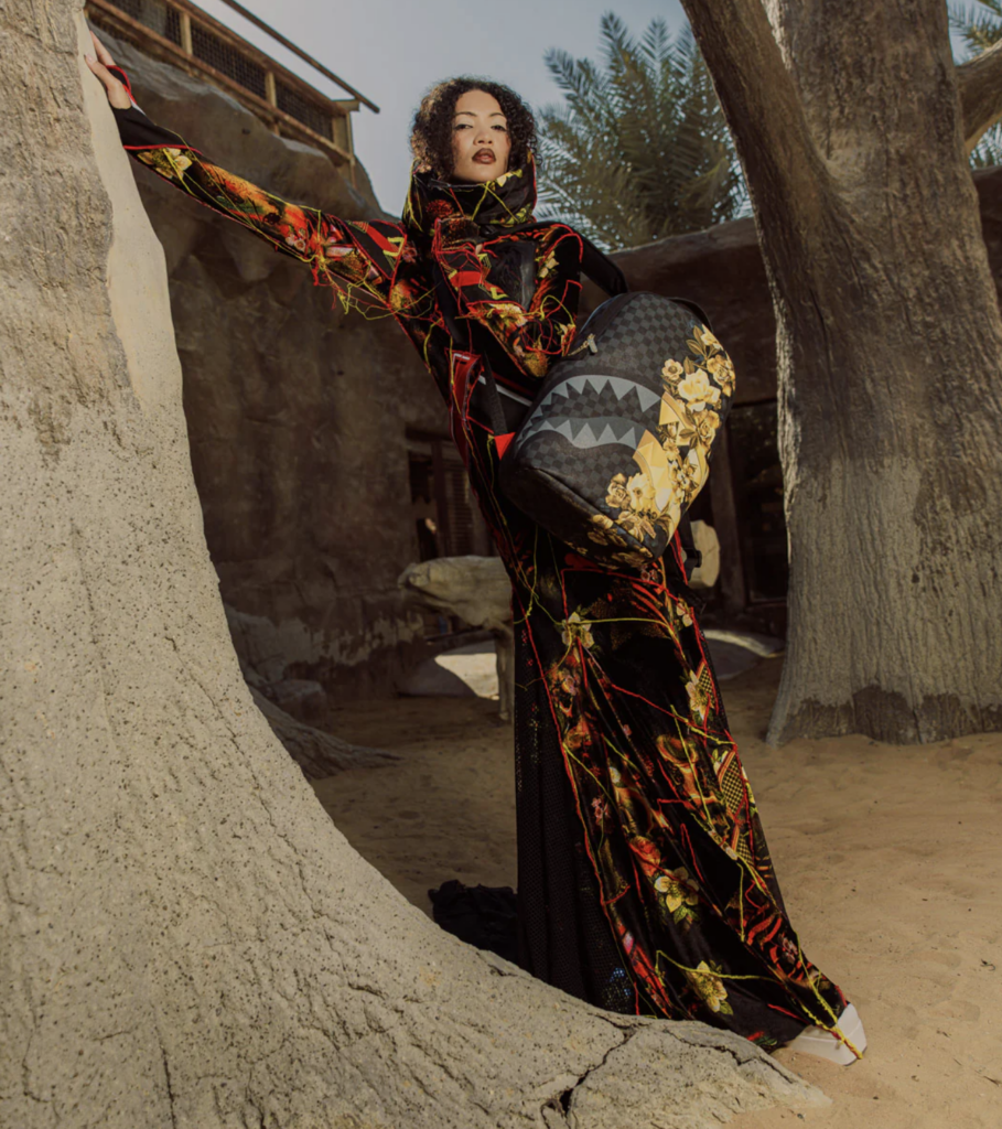 woman with elegant golden backpack