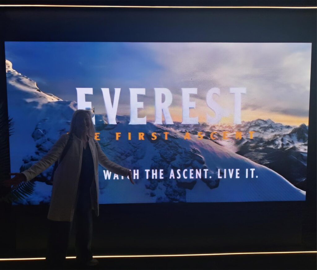 London Mums Magazine writer at Eclipso Camden with an immersive Everest mountain scene in the background