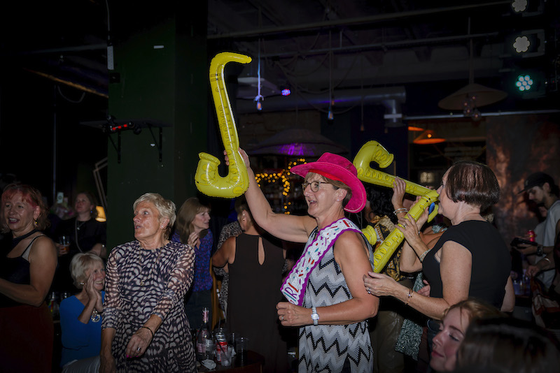 women having fun at sax party